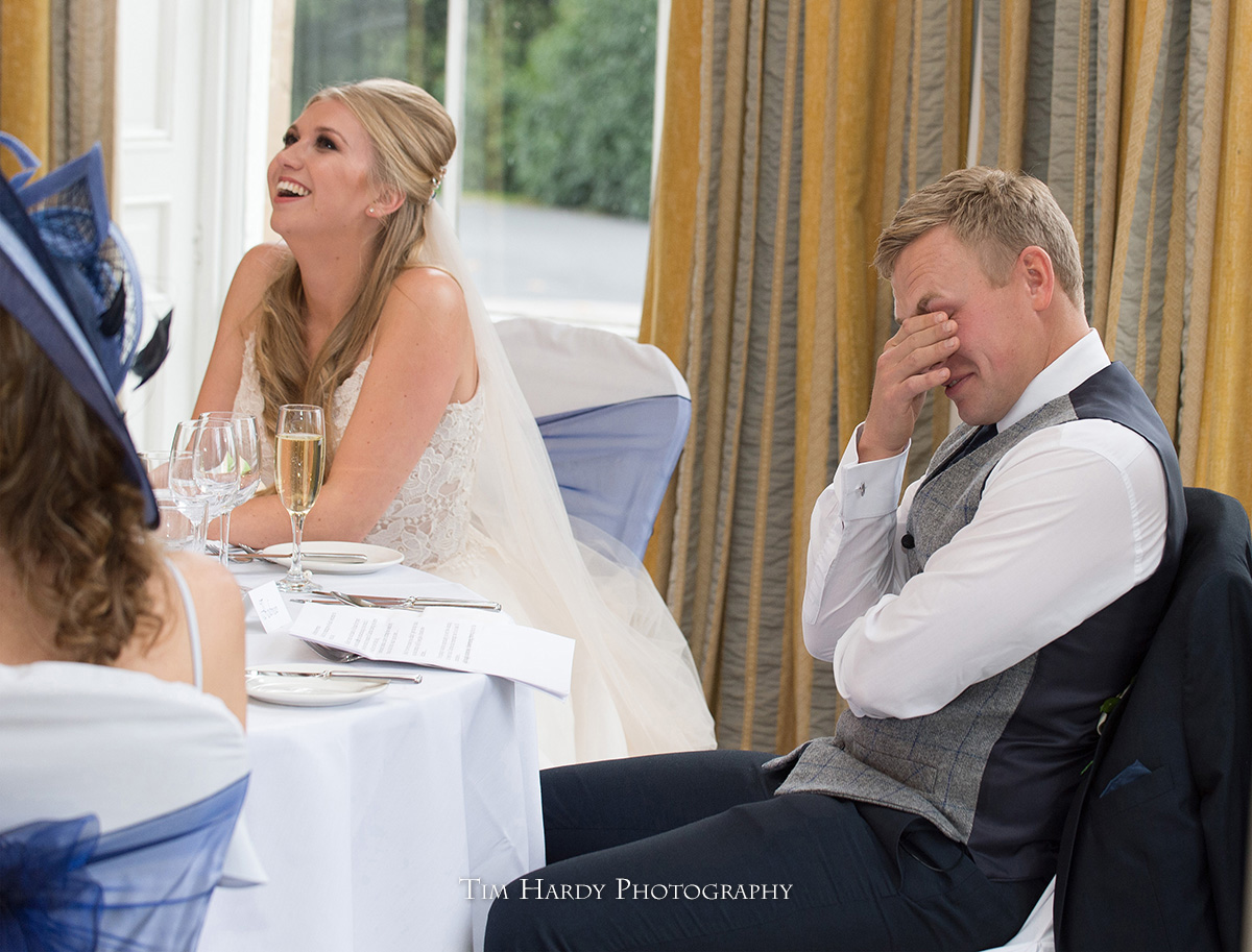 embarrassed groom during speeches